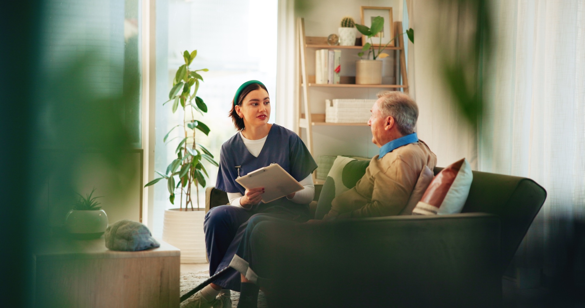 Caregiver with resident in a warm, homelike setting
